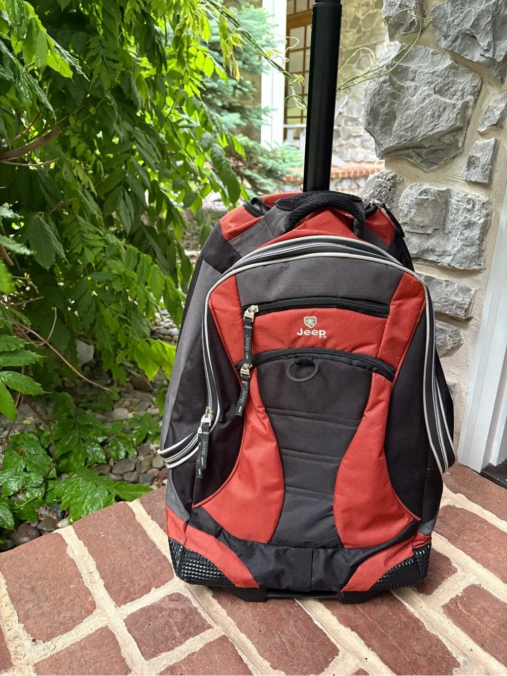 Jeep Rolling Backpack Carry On Luggage in Orange and Black CLEAN Good Condition